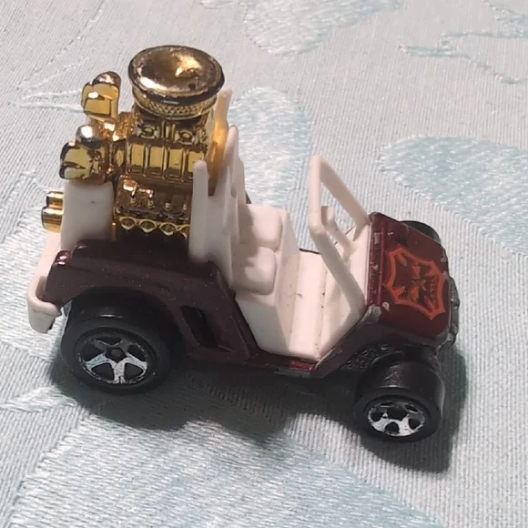 Gold and White Toy Car