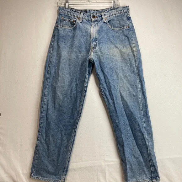Vintage Levis 565 Loose Fit Wide Leg Jeans Light Wash Blue Mens 33x30 USA Made