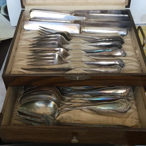 Vintage silverware set in original wooden chest with certificate of authenticity