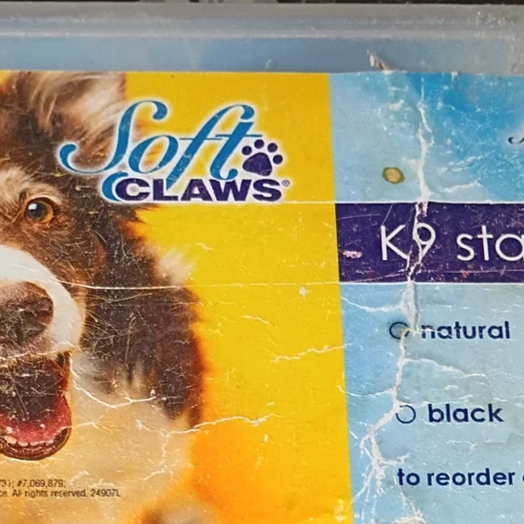 Soft Claws Pet Nail Caps in Yellow and Blue Packaging
