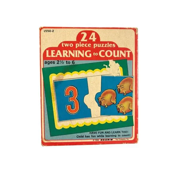 Vintage kids puzzle- made in USA- 1985- includes box- had signs of wear- numbers