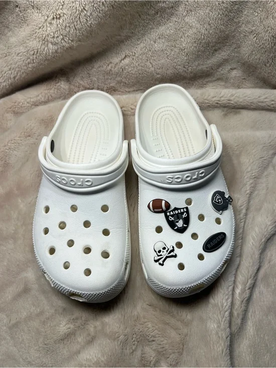 Crocs women’s size 10 mens size 8 raiders football