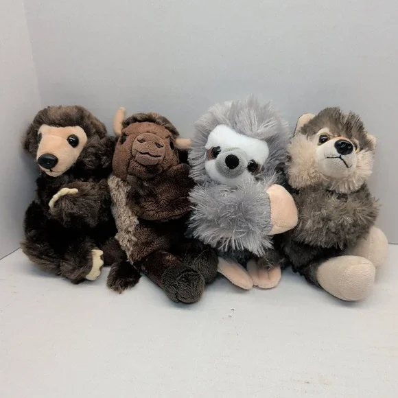 Lot of 4 Wild Republic Plush Huggers Slap Bracelet Buffalo Wolf Bear Sloth
