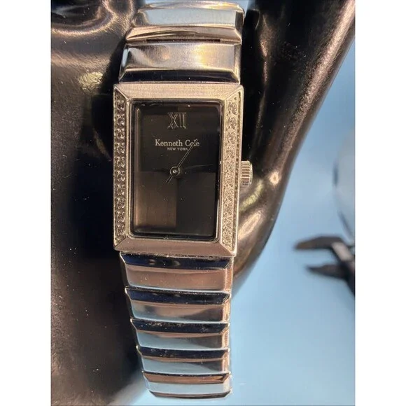 Ladies Kenneth Cole New York Rectangle Silver Tone Black Dial Analog Watch