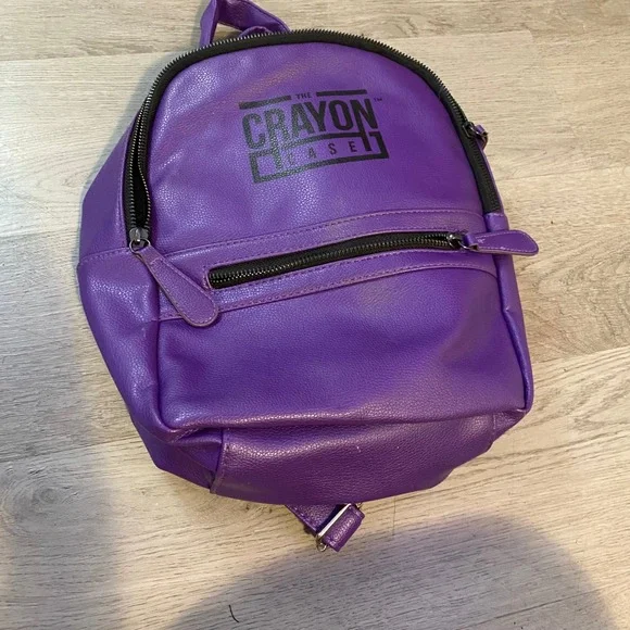 The Crayon Case Mini Backpack Womens Small Purple Faux Leather Logo Bag