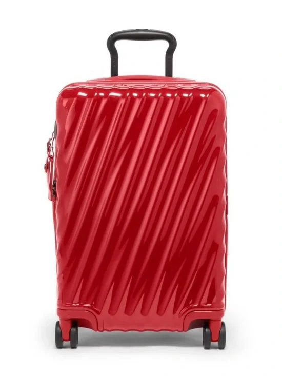 Tumi authentic International Expandable 4 Wheeled Carry-On