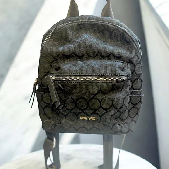 Chic & Compact: Nine West Taren Mini backpack Black logo canvas & leather