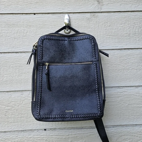 Calpak Kaya black faux leather laptop travel backpack
