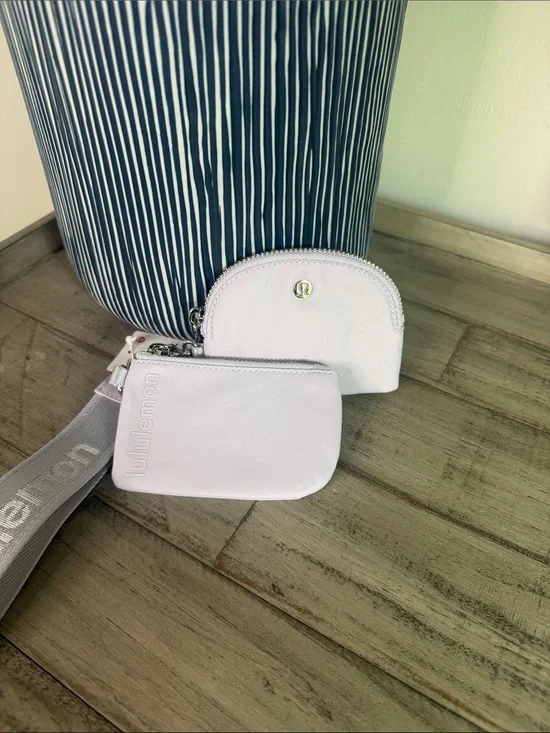 Lululemon dual Pouch Wristlet* Metallic Wordmark