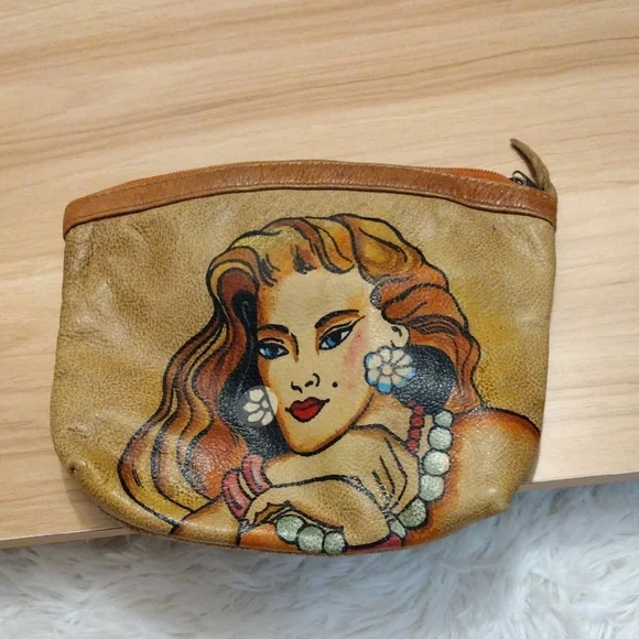 Handcrafted Tan Leather Pouch with Artistic Design