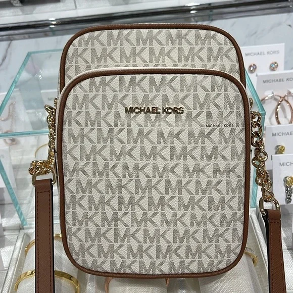 MICHAEL KORS Jet Set Travel Md NS Logo Crossbody Flight Bag Messenge Vanilla NWT