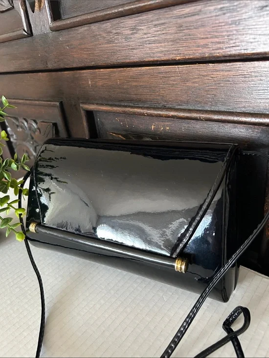 Ande Sleek Black Patent Crossbody with Gold Accent