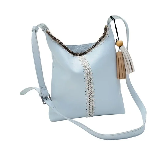 The Sak Huntley Chambray Blue Pebbled Leather Hobo Crossbody Bag Tassel Boho