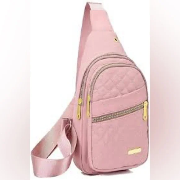 Pink Cross Body Backpack with gold zipper pockets