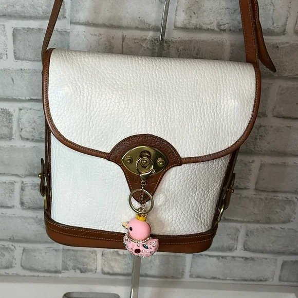 (25) Vintage Dooney & Bourke White and Brown Crossbody Bag