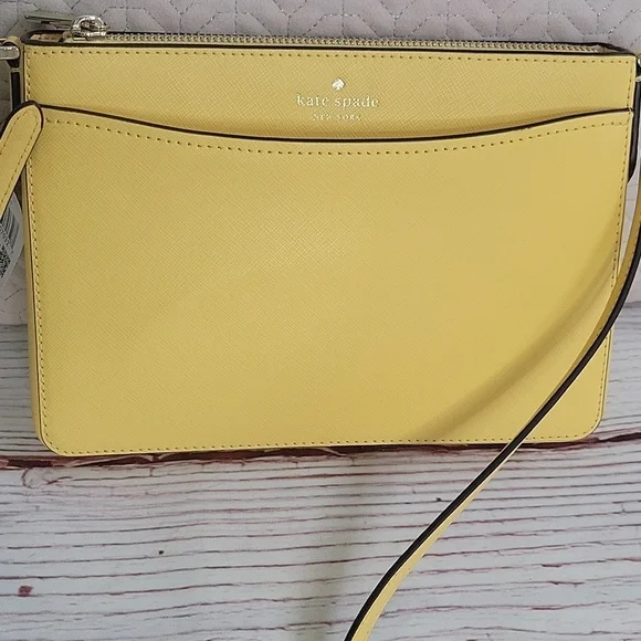 Kate Spade Butter Yellow Crossbody Bag with Minimalist Design NWT
