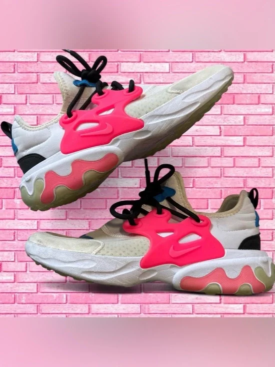 Nike Pink and White Slip-On Sneakers with Coral Accent