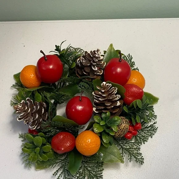 Festive Holiday Candle Wreath with Red and Orange Accents