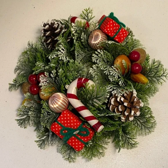 Festive Holiday Candle Wreath with Red Accents