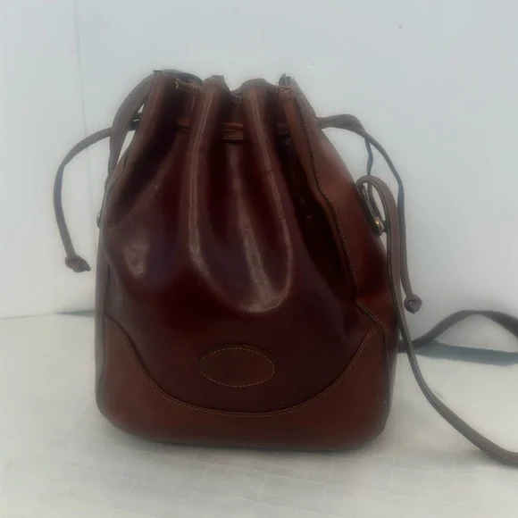 Oroton tan Molded cowhide Leather Drawstring bucket bag.