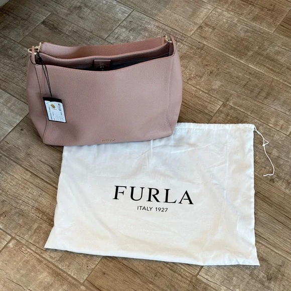 Furla Grace medium bag in a light pink. Comes with Dustbag. NWT