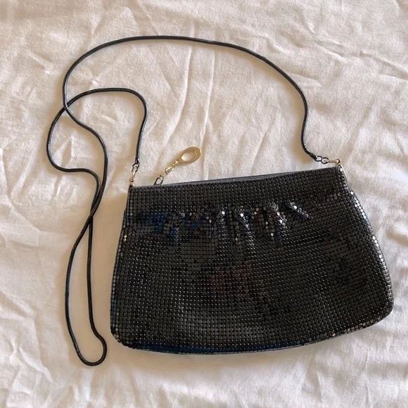 9”x5.5” Black party purse‎ with gold accent trim