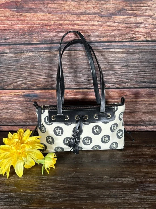 Dooney & Bourke Vintage logo jacquard handbag in cream and black.