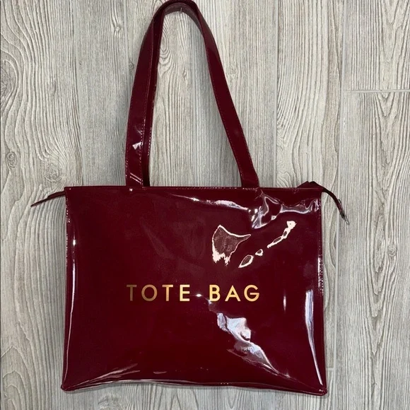 Glossy Red Tote Bag with Gold Lettering the perfect traveling bag