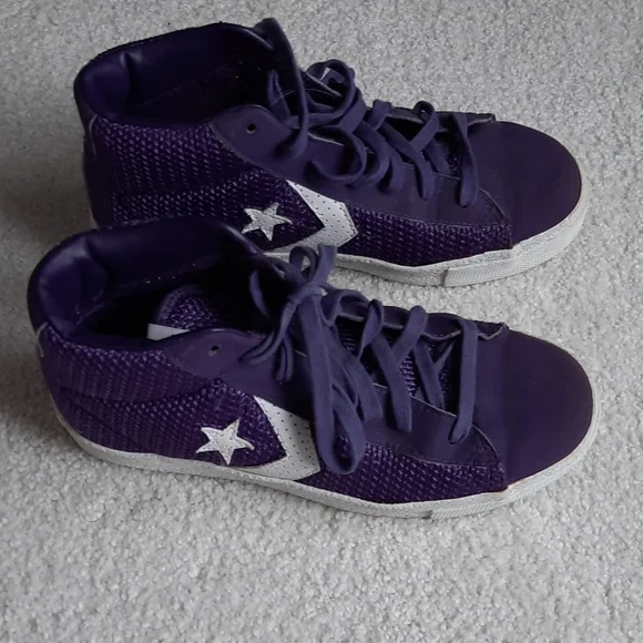 3 For $30. 24. Purple and white converse mid-top seankers.