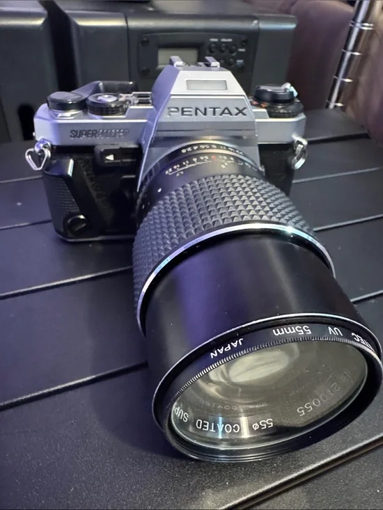 Pentax Silver and Black Film SLR with 55mm Coated Lens