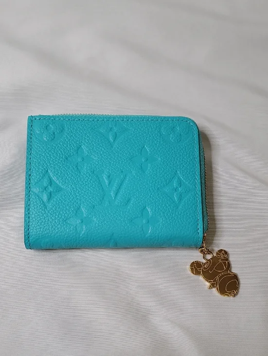Louis Vuitton X TM Turquoise Embossed Monogram Zip Wallet