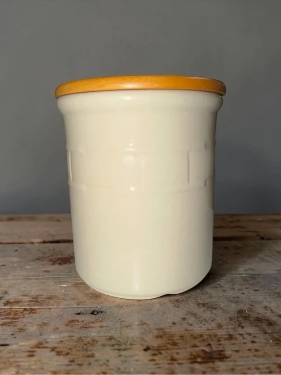 Longaberger Cream Ceramic Canister with Yellow-Orange Lid
