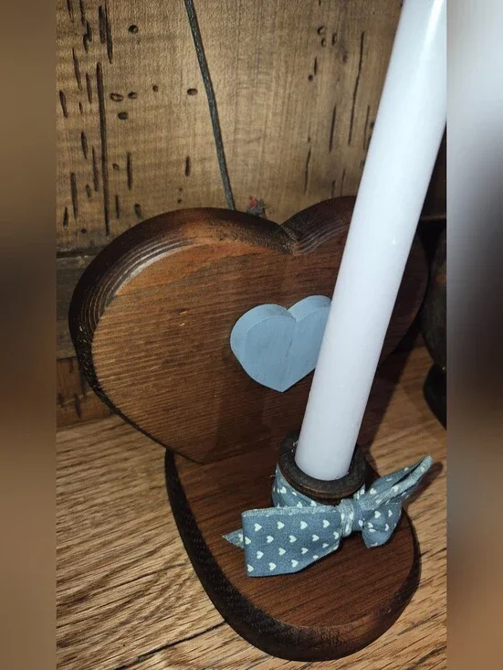 Set of handmade rustic wooden heart candle holders featuring blue heart accents