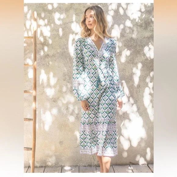 Sunny Spirit Maxi Boho Floral Print V Neck Flowy Tassel with Long Puff Sleeves.