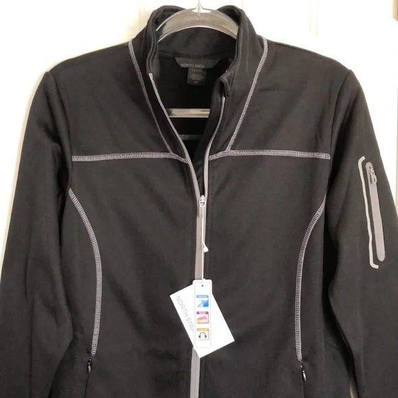 New Women’s North End lightweight jacket.  Size S.  Reflective strips. Black.