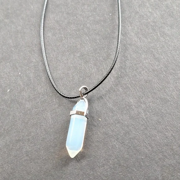 Clear crystal point pendant necklace on 16-inch faux leather chain