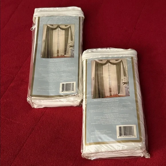 Elegant sheer white Curtain panels.