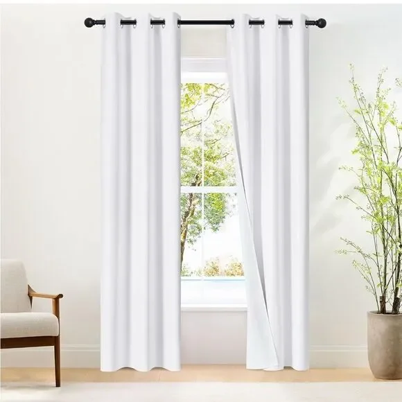 52 x 72 pair pure white blackout curtains. 1.6 silver Grommet