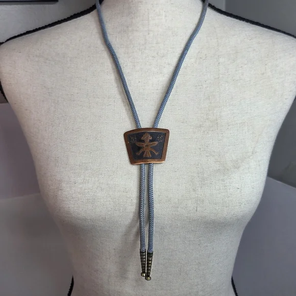 vtg bell trading post solid copper native dancer bolo tie grey cloth cord southw