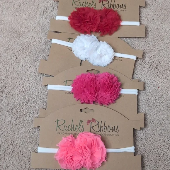 A set of 4 baby girl headbands Rachel's ribbons red, white and 2 different pink