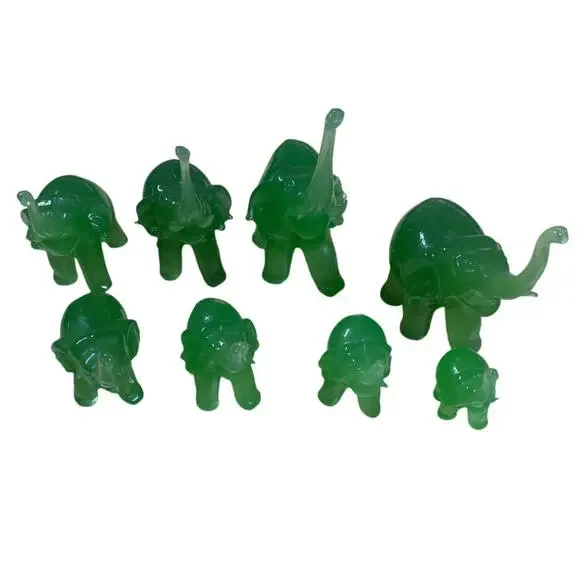 Vintage Set of 8 Green Glass Handmade Elephant Figurines Good Used Condition