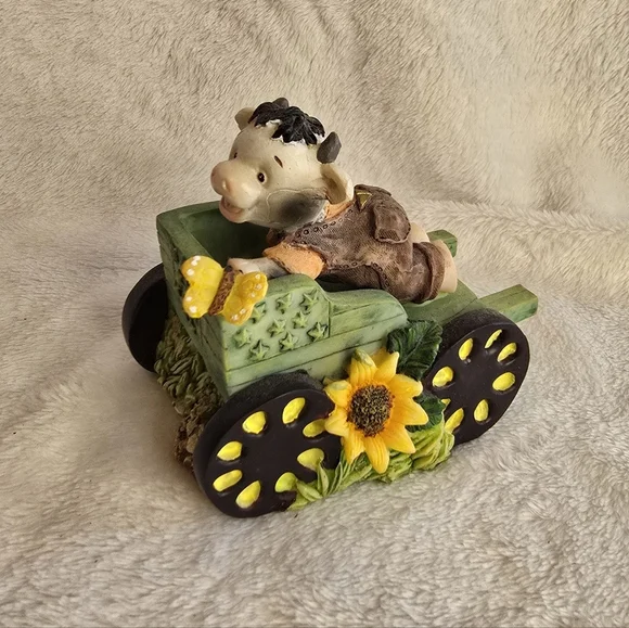 Charming Cow Figurine on Green Wagon Y2K