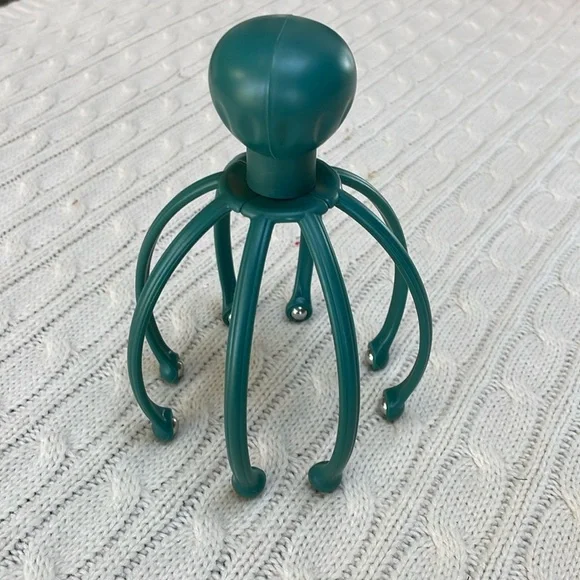 Scalp massager gently massages pressure points and sensitive nerves on head/neck