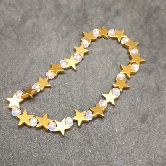 Handmade kids gold tone star stretch bracelet
