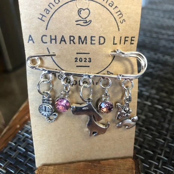 NWT, Handmade by A Charmed Life. Silver Pin with Adorable Silver Charms