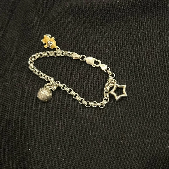 Sterling Silver 3 1/4” Size Wrist Charm Bracelet for Child.  Has  3 Charms. Good