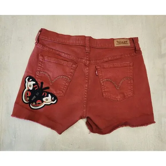 Levis Women's Cut off Denim Shorts SZ 4 Distressed Butterfly Patch Rust