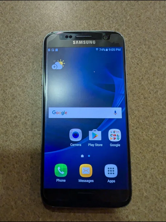 Samsung Black Smartphone with Blue Home Screen