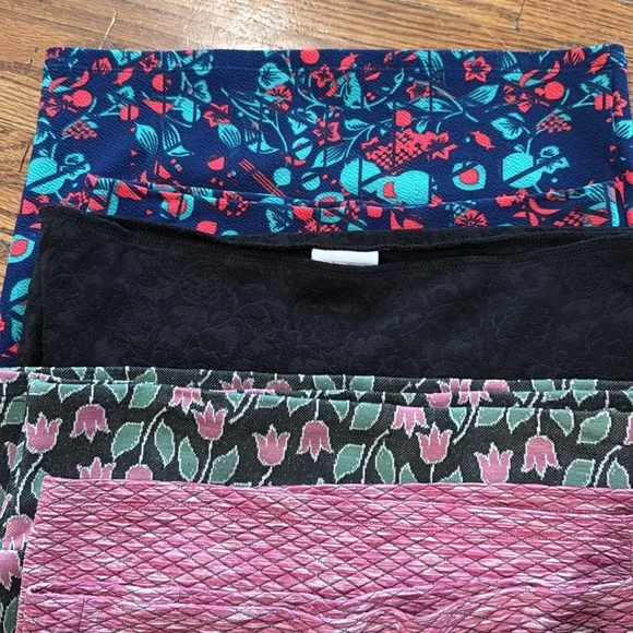 Group of 9 XS and Small LulaRoe skirts in various colors and patterns