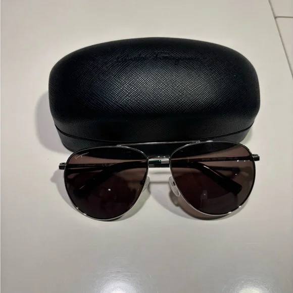 Ferragamo men sunglasses worn twice